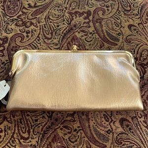 Light gold clutch that is actually functional, lots of space, new